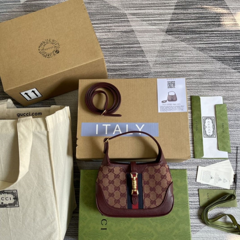 G*u*i top handle bags